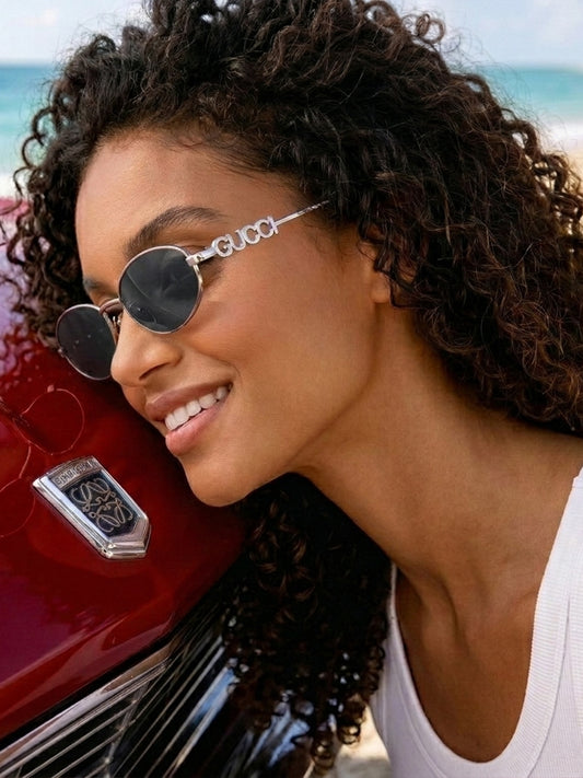 The Womens G.U.C.C.I Sunglasses GG1802S Iconic Silver Frame with Gray Lenses