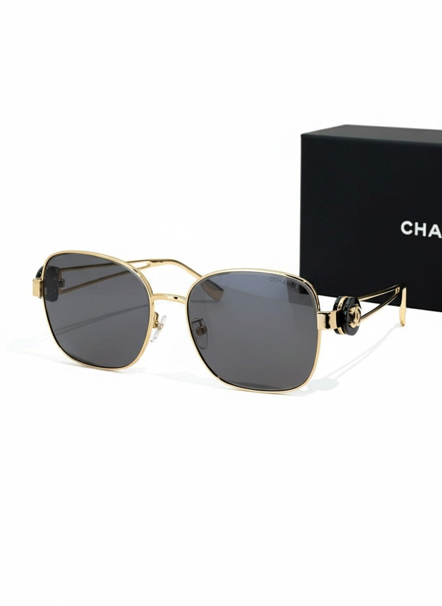Luxury sunglasses with a gold metal frame and gradient lenses - luxurious design and UV400 protection