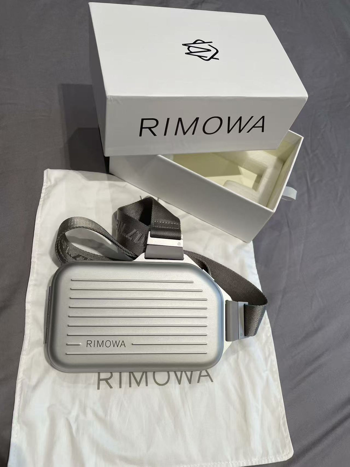 R.I.M.O.W.A Personal Sling Clutch Silver