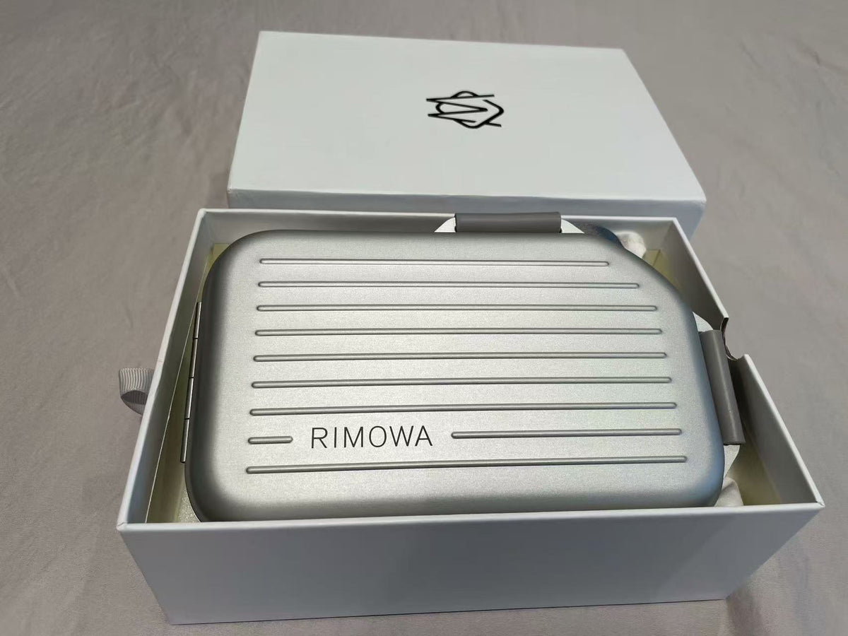 R.I.M.O.W.A Personal Sling Clutch Silver