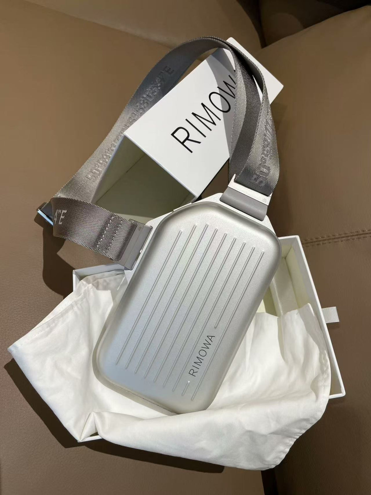 R.I.M.O.W.A Personal Sling Clutch Silver