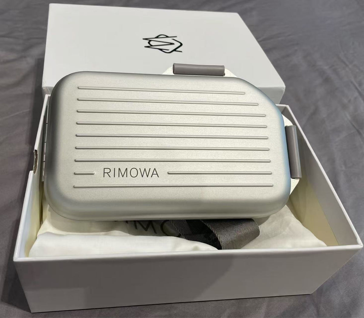 R.I.M.O.W.A Personal Sling Clutch Silver