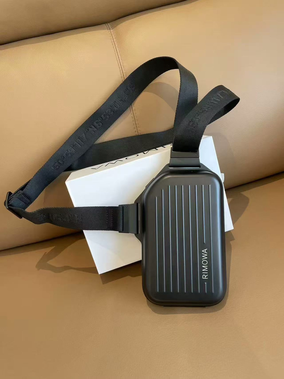 R.I.M.O.W.A Personal Sling Clutch Silver