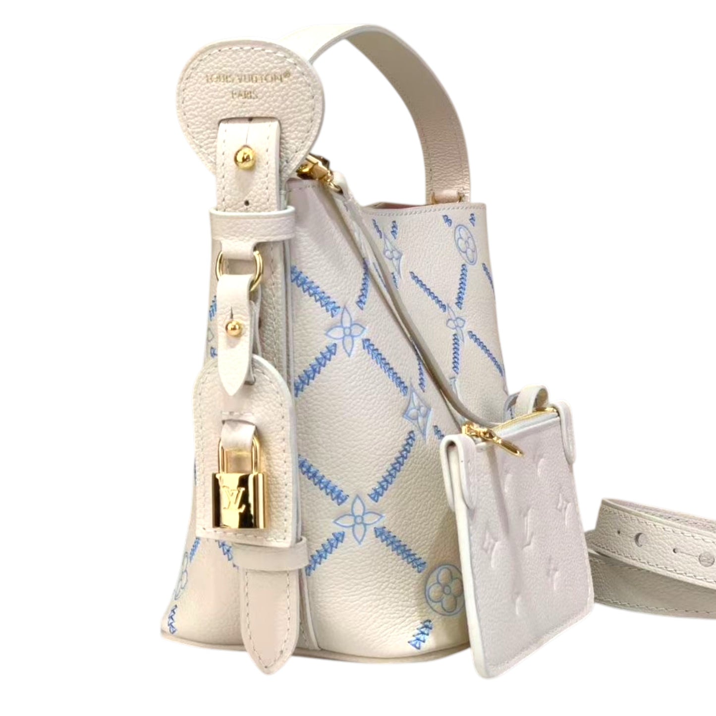 Designer handbag with intricate patterns and gold accents on a white background