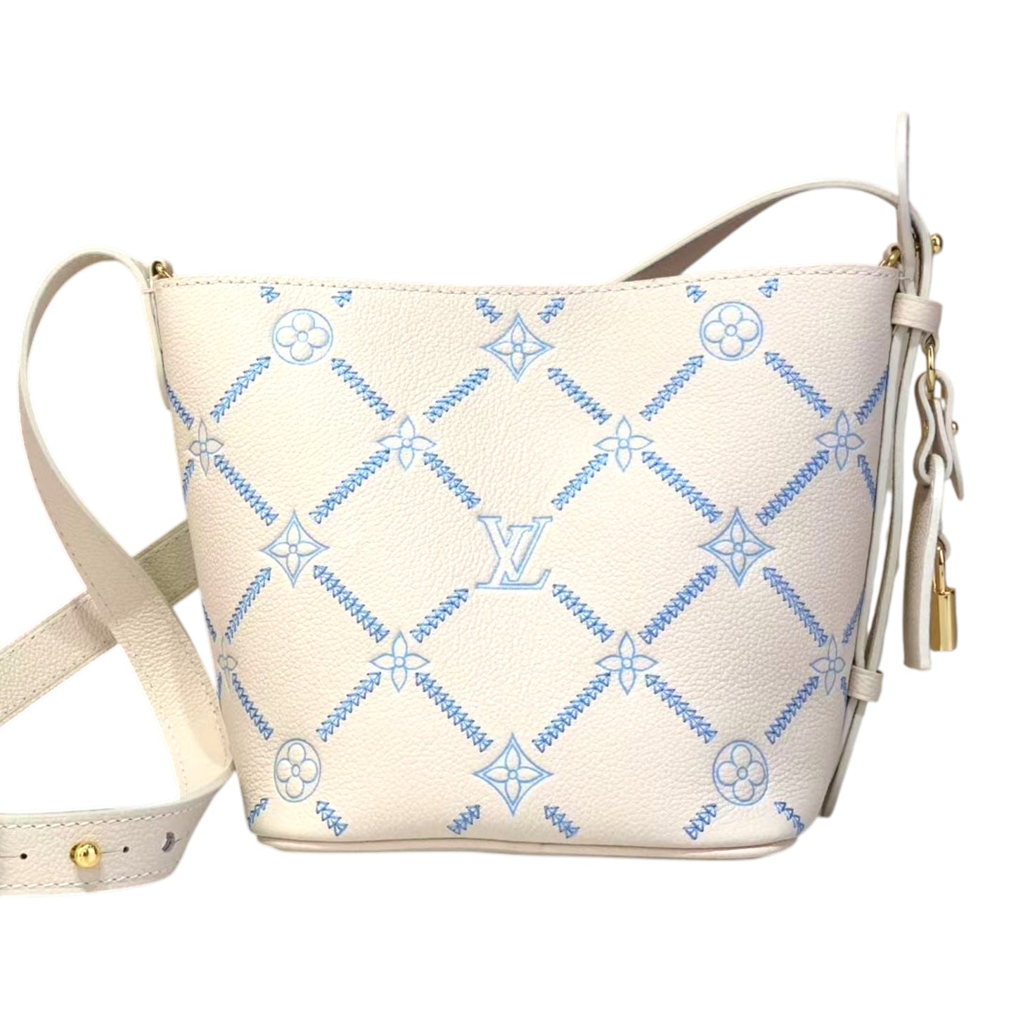 White handbag with blue geometric pattern on a white background