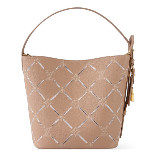 Beige handbag with diamond pattern on a white background