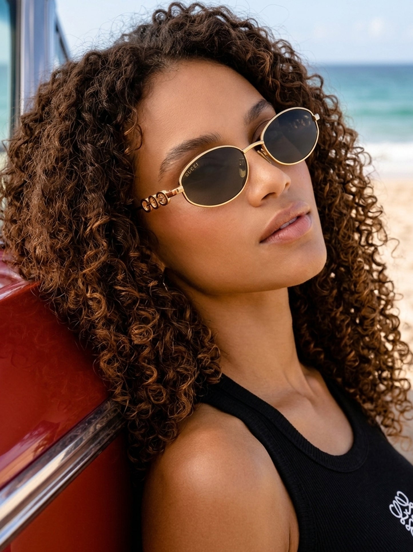 The Womens G.U.C.C.I Sunglasses GG1802S Iconic Gold Frame with Black Lenses